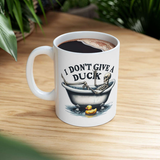 Ceramic Mug, I Don't Give A Duck; Skeleton Humor Mug Printify