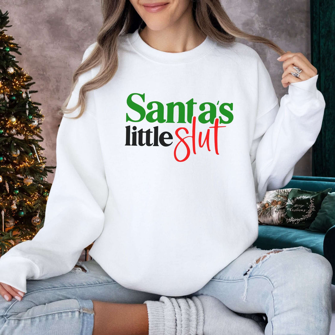Santa's Little Slut Christmas Sweatshirt Sweatshirt Printify L White