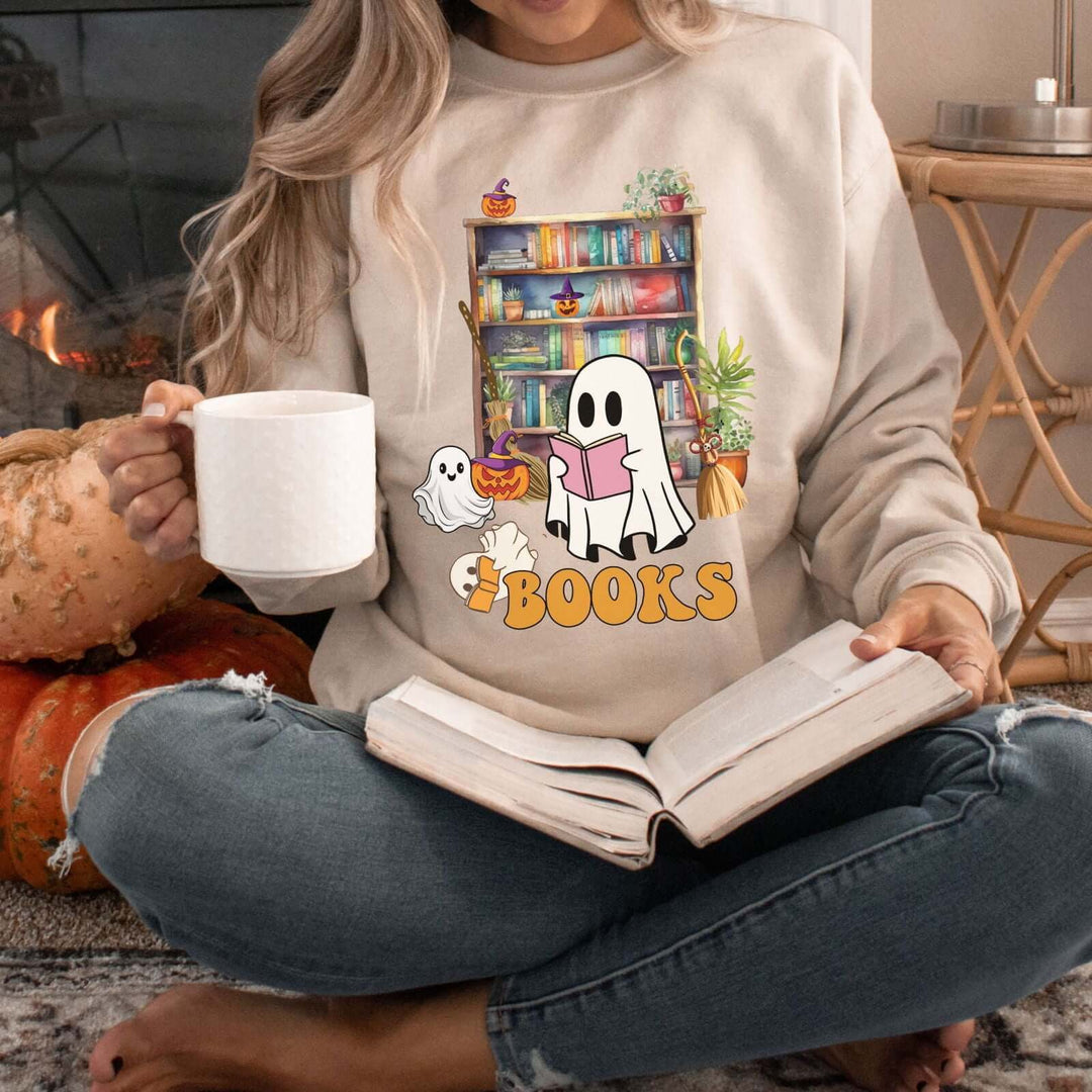Bookworm Witch Fall Sweatshirt: "BOOKS" Design, Ghosts & Pumpkins Sweatshirt Printify