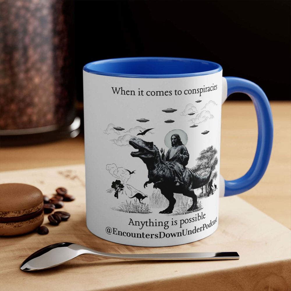 Encounters Down Under Podcast Supporting UFO Mug - Jesus Riding Dinosaur Mug Printify 11oz Blue
