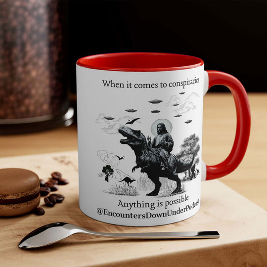 Encounters Down Under Podcast Supporting UFO Mug - Jesus Riding Dinosaur Mug Printify 11oz Red