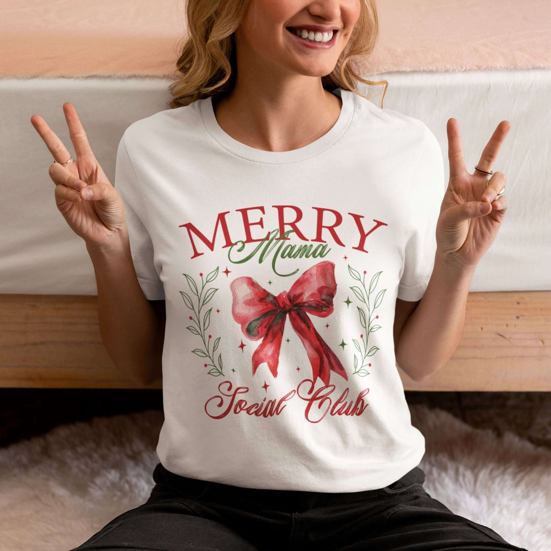 Merry Mama Social Club: Coquette Bow Christmas T-Shirt T-Shirt Printify