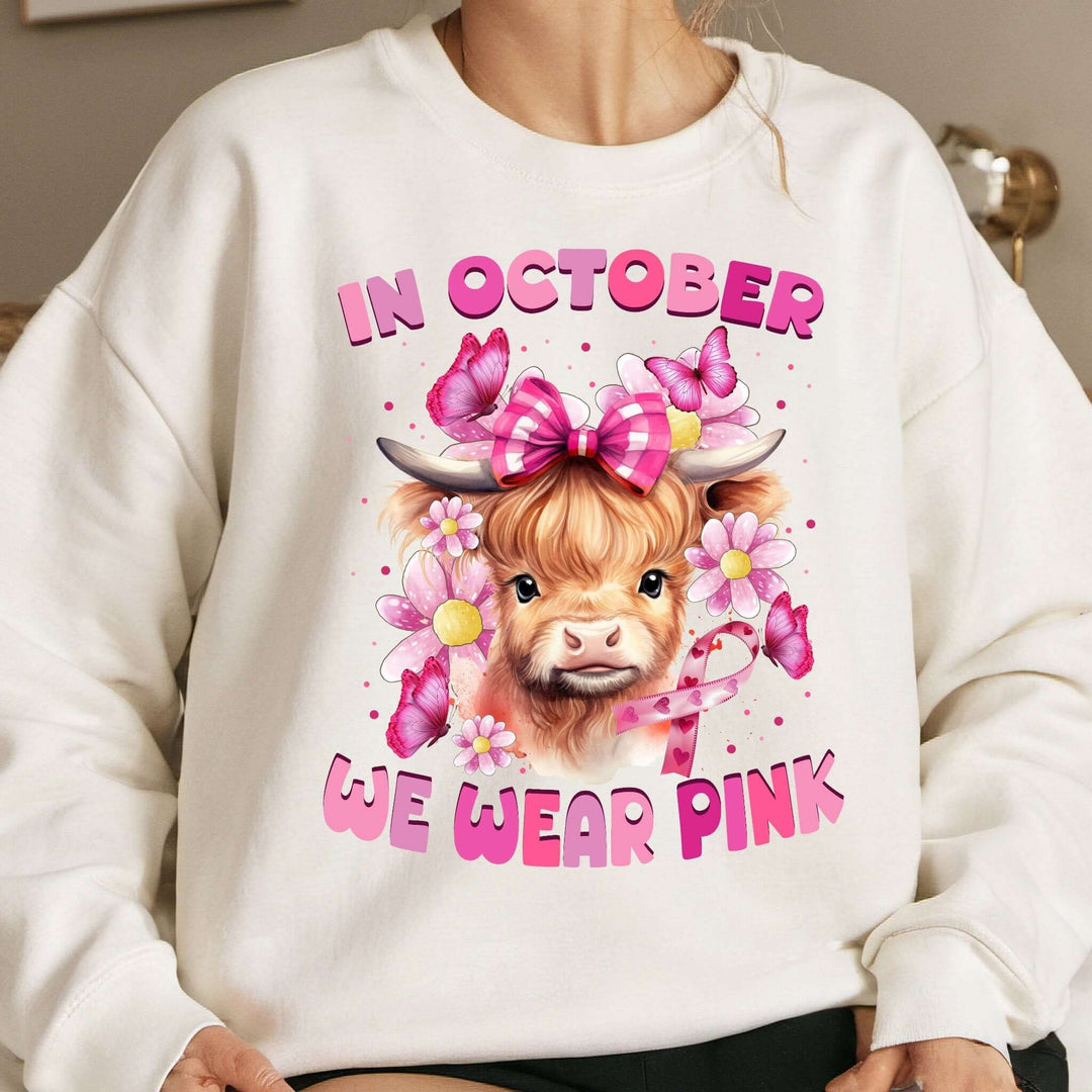 Breast Cancer Highland Cow In October We Wear Pink Sweatshirt Sweatshirt Printify