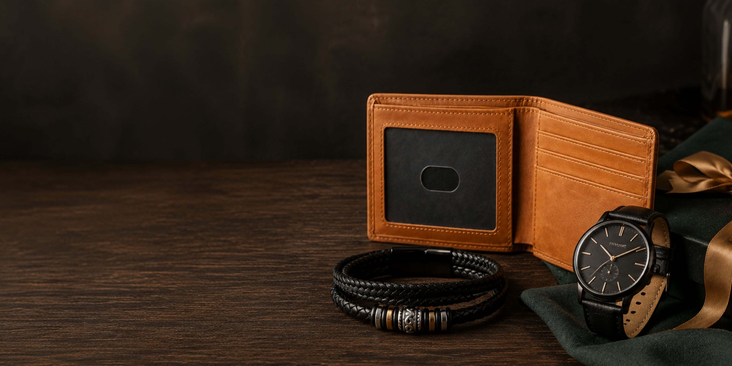 Stylish gifts for boyfriend featuring a watch, leather wallet, and braided bracelet.