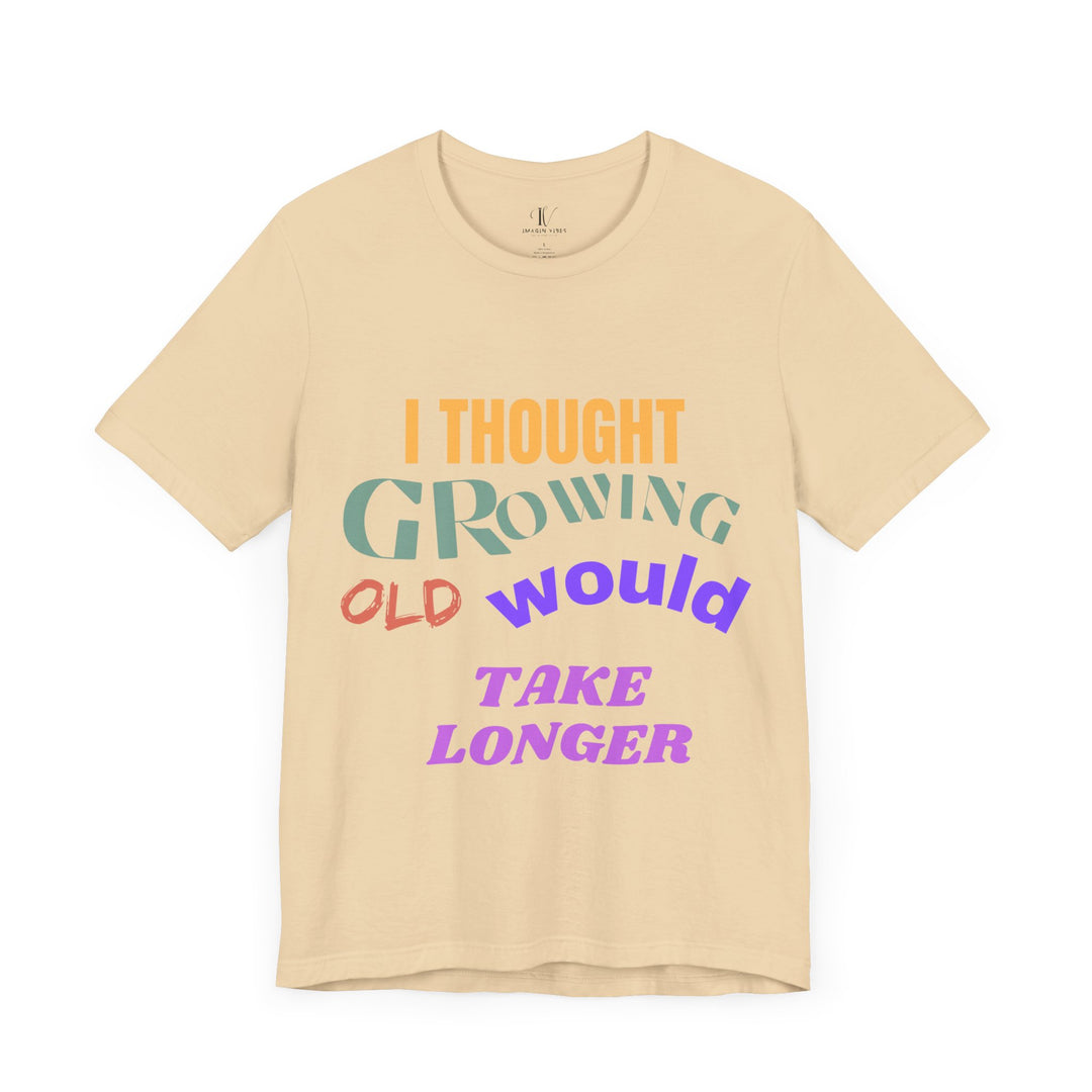 Graphic Tee 'I THOUGHT GROWING OLD WOULD TAKE LONGER' T-Shirt Printify Soft Cream S