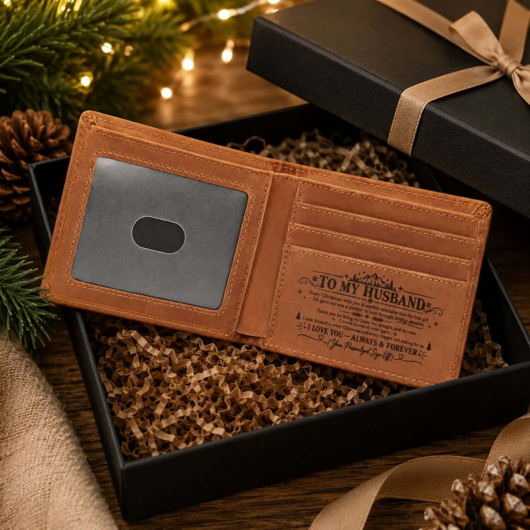 Christmas gift for husband wallet in a gift box with a personalized message inside.