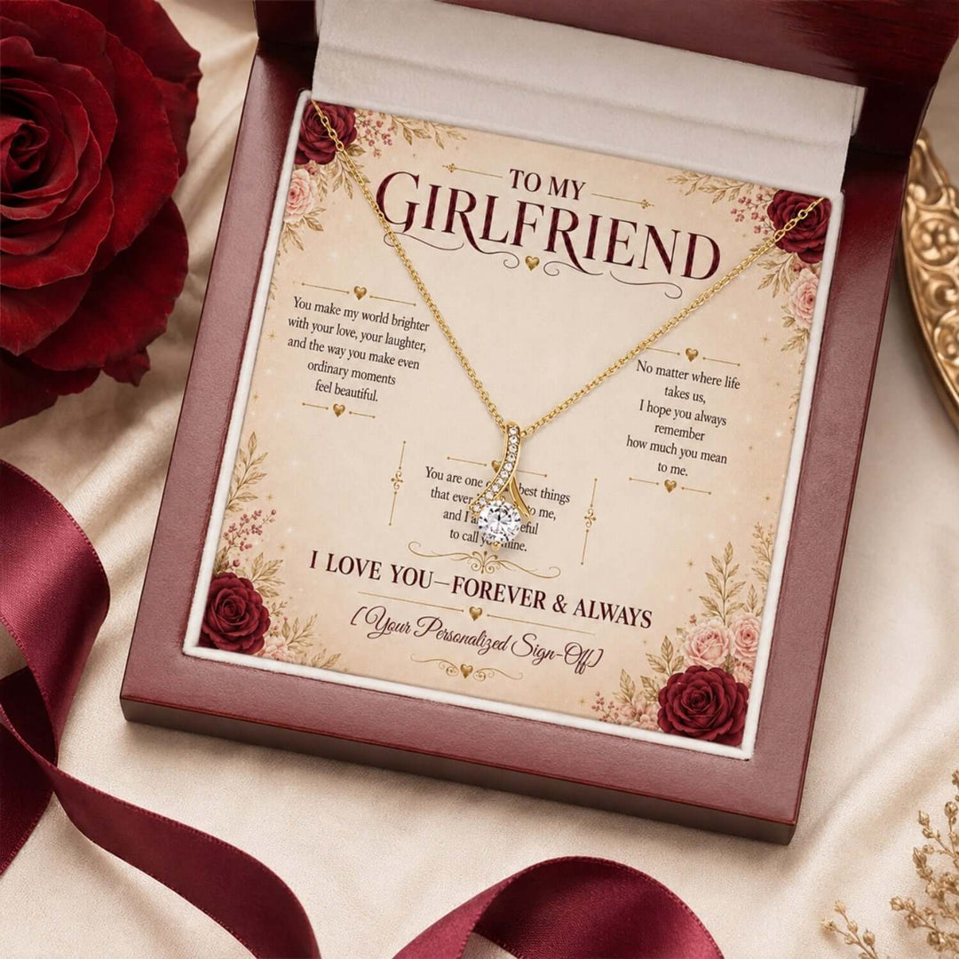 To My Girlfriend message card with Alluring Beauty Necklace for girlfriend, surrounded by roses and a satin ribbon.