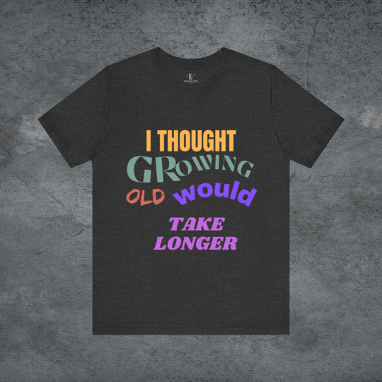 Graphic Tee 'I THOUGHT GROWING OLD WOULD TAKE LONGER' T-Shirt Printify Dark Grey Heather S