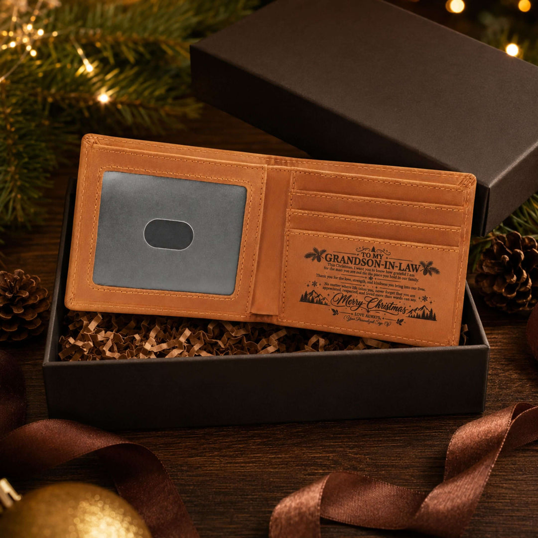 To My Grandson-in-Law Christmas wallet displayed in an open box with pinecones and holiday decor.