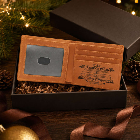 To My Grandson-in-Law Christmas wallet displayed in an open box with pinecones and holiday decor.