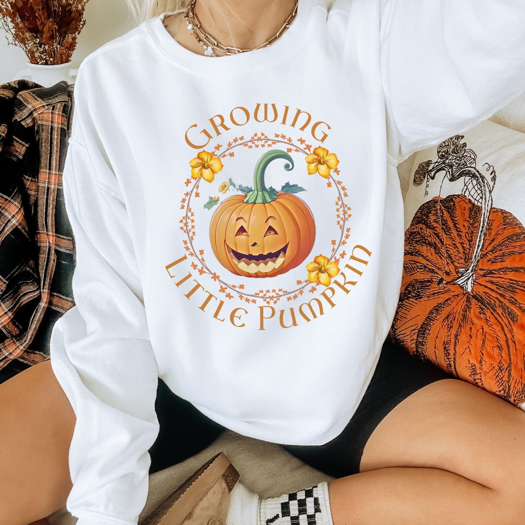 Maternity Sweatshirt for Fall Pregnancy Announcement - Halloween Jack-o'-lantern Sweatshirt Printify