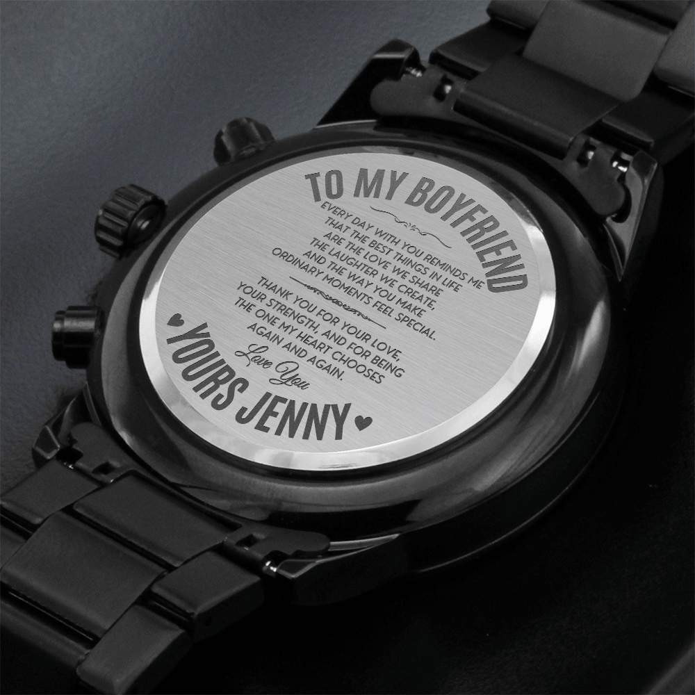 Engraved watch for boyfriend showcasing personalized message on the back with a bold black design.