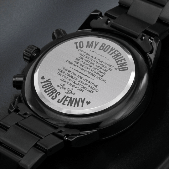 Engraved watch for boyfriend showcasing personalized message on the back with a bold black design.