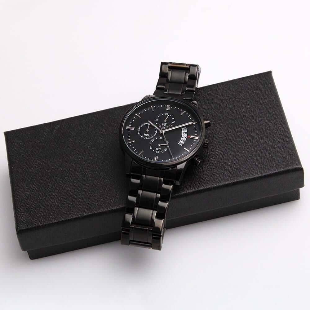 Engraved watch for boyfriend displayed on a sleek black box, showcasing its stylish black band and dial.