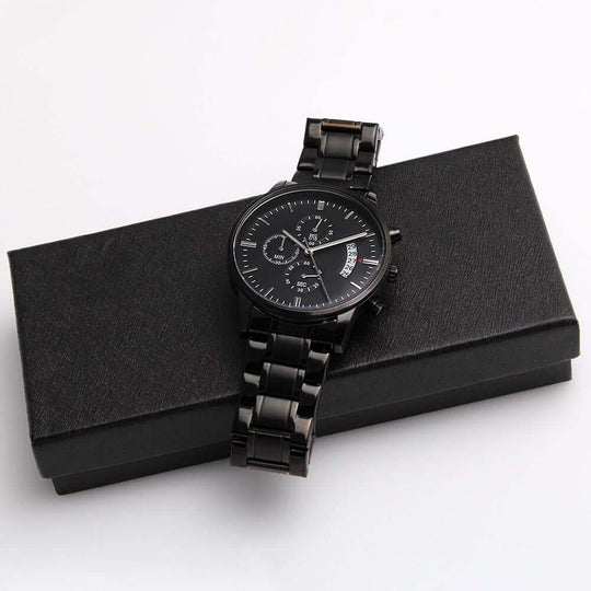Engraved watch for boyfriend displayed on a sleek black box, showcasing its stylish black band and dial.