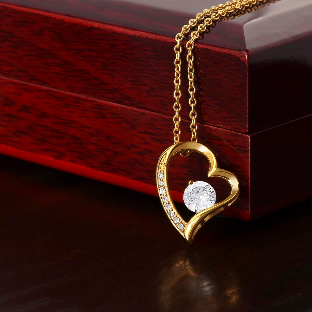 Beautiful heart-shaped gold necklace with sparkling decoration, perfect for a girlfriend necklace gift.