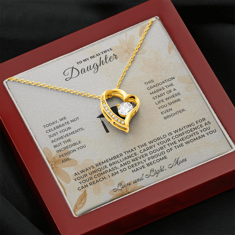 Graduation Gift for Daughter  – Graduation Necklace featuring a heart pendant with a sparkling gemstone.