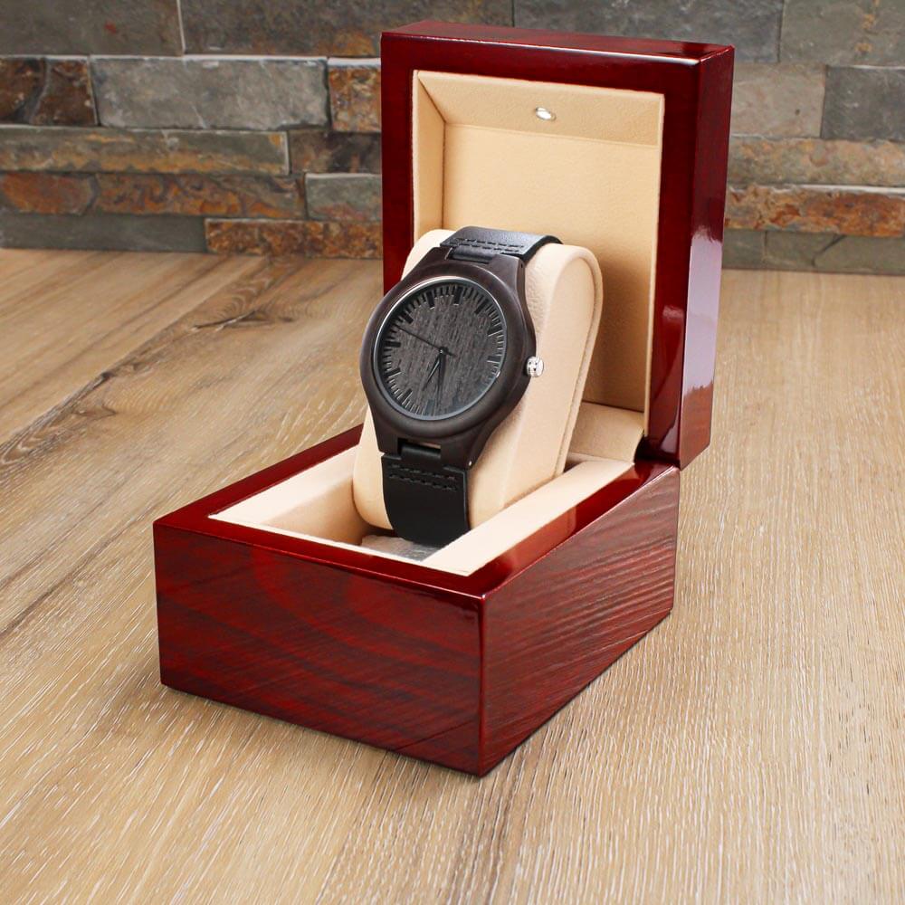 Sentimental adult brother engraved wooden watch in a luxury presentation box on a wooden surface.