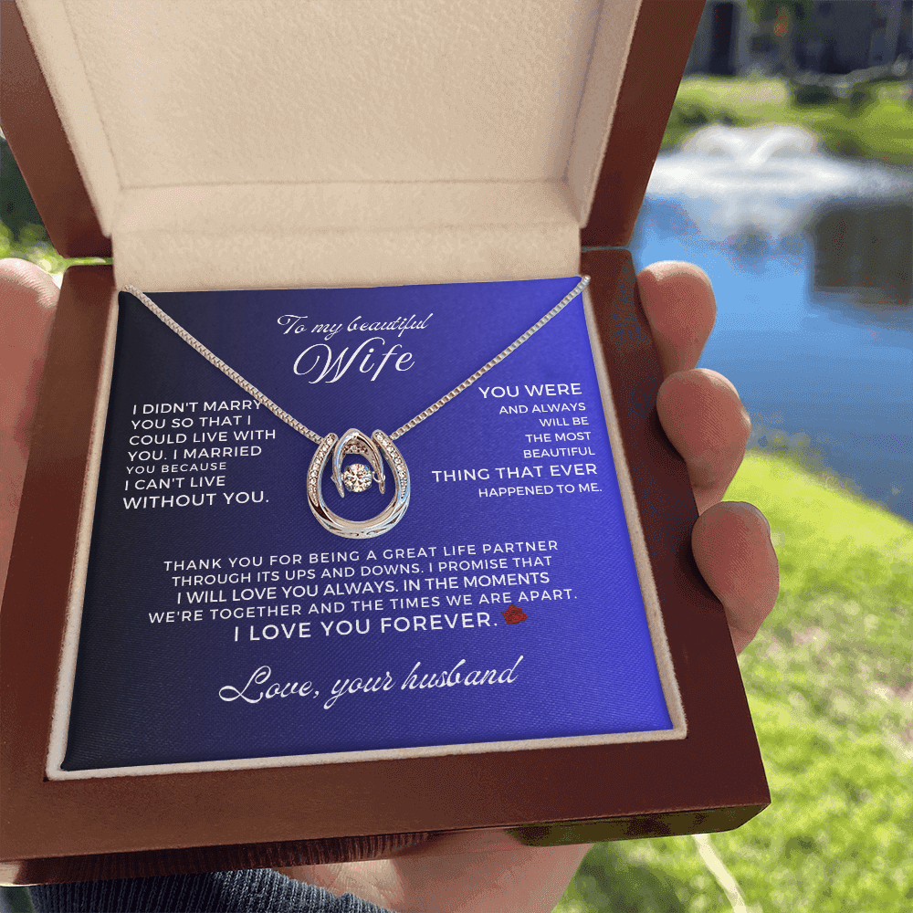 Wife's white gold dipped moving CZ necklace in gift box, perfect meaningful milestone wedding anniversary or valentine gift for wife.
