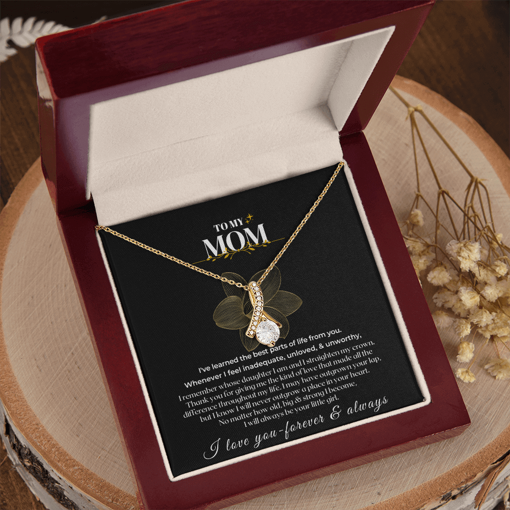 Sentimental butterfly pendant necklace in a gift box for meaningful mom jewelry gift set, showing love and appreciation.