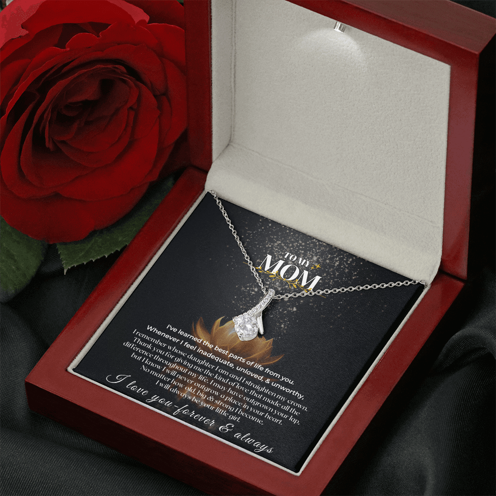 Sentimental mother appreciation keepsake pendant in a jewelry box with a note for mom and a red rose.