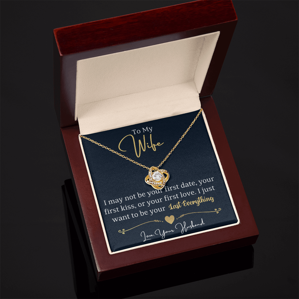 Romantic Wedding Anniversary Gift For Her featuring a love knot necklace in a gift box with heartfelt message for wife.