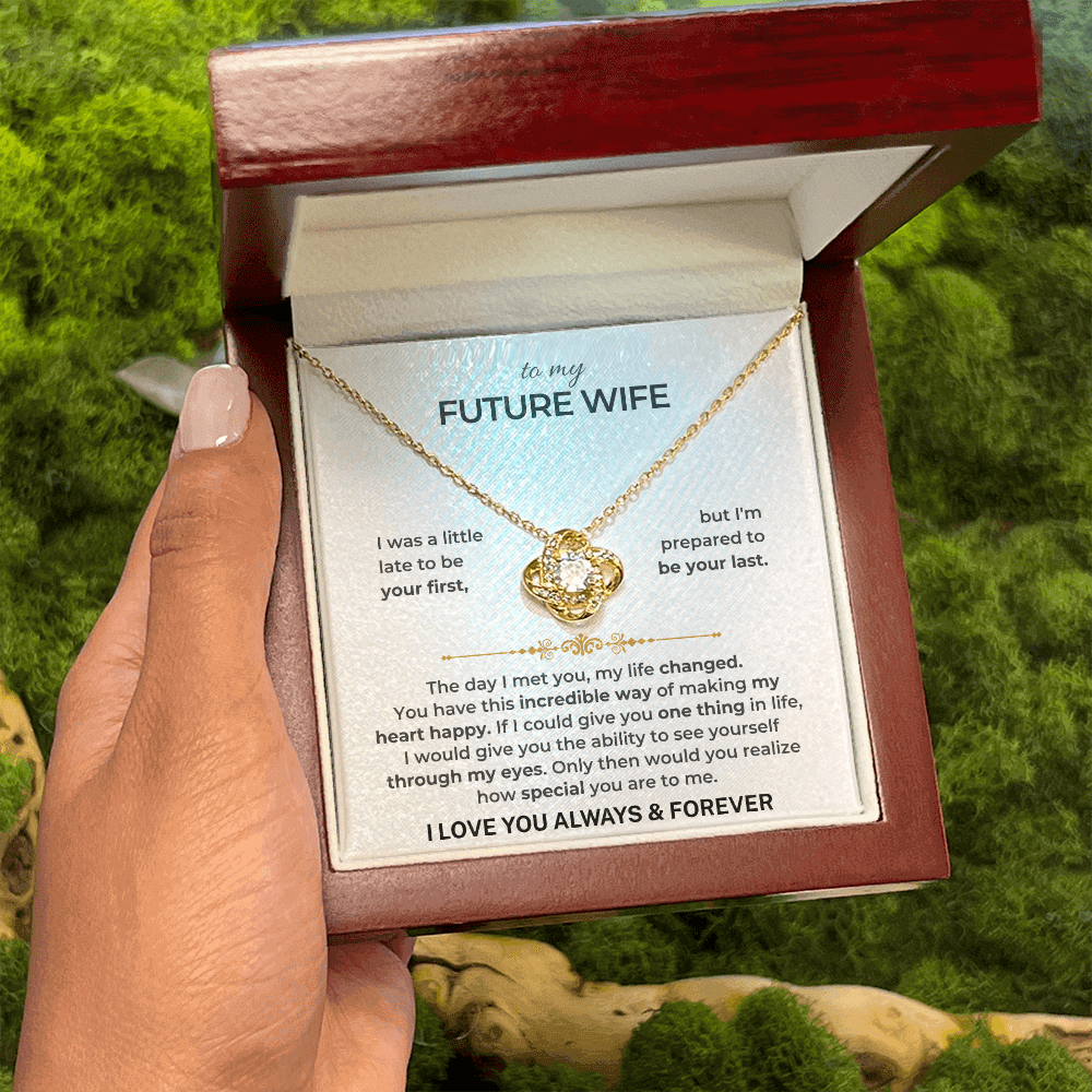 Elegant necklace presented as meaningful proposal or unexpected surprise gift for future wife in wooden box.