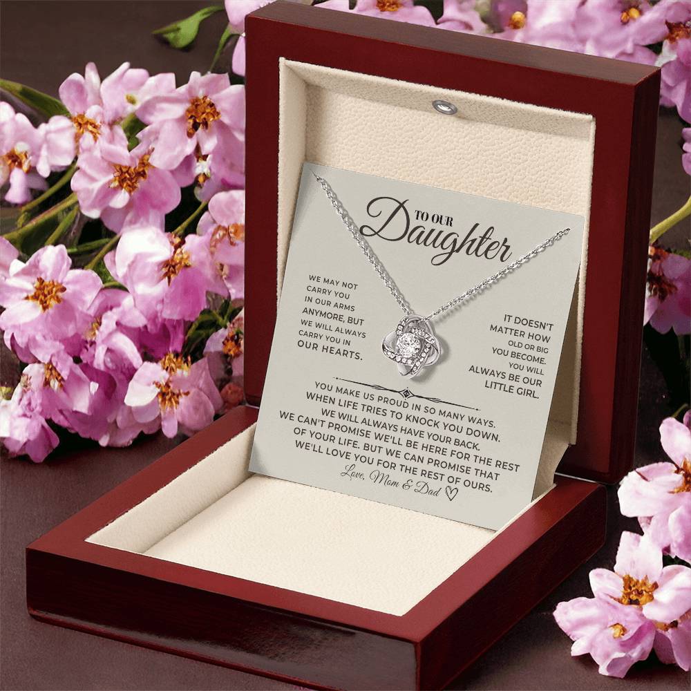 Meaningful milestone graduation or birthday gift for daughter from parents, love knot CZ necklace in a presentation box.