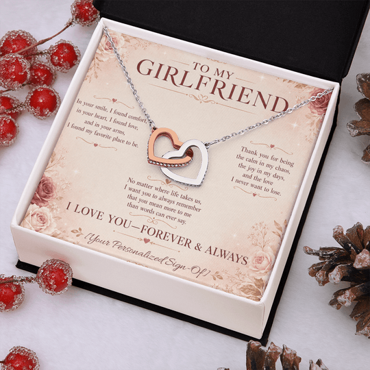 Interlocking hearts necklace for girlfriend displayed in a gift box with heartfelt message card.