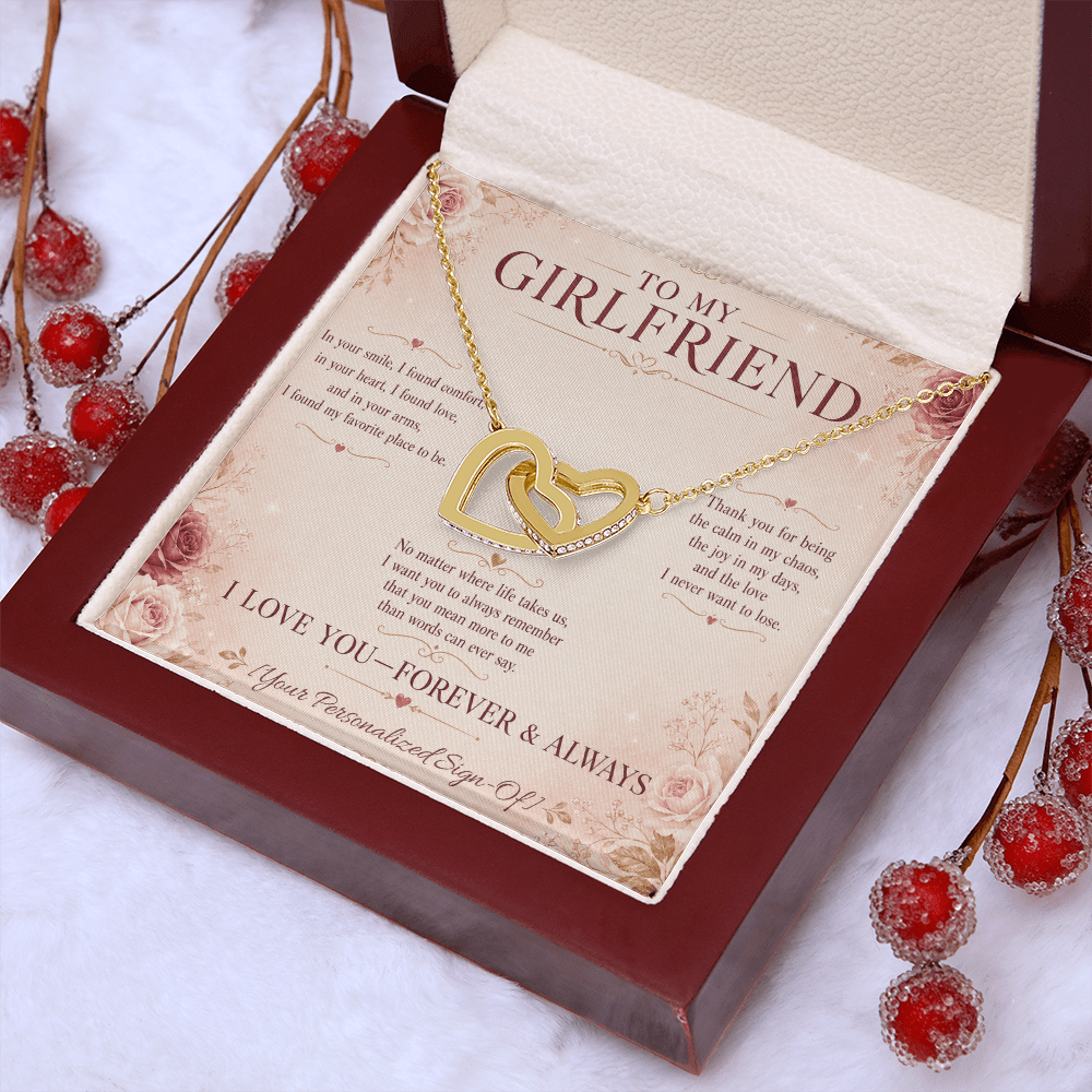 Interlocking hearts necklace for girlfriend in a gift box with heartfelt message card.