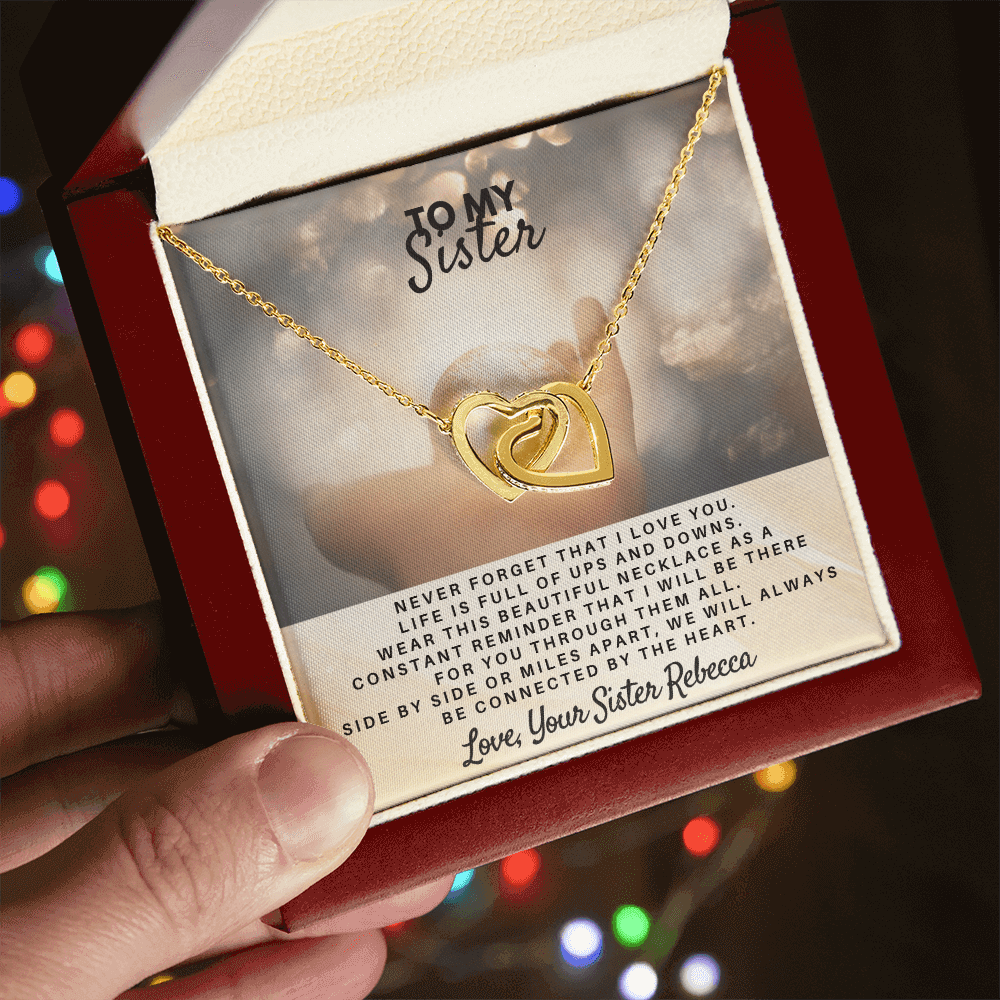 Sentimental sibling connected by heart keepsake necklace from USA in elegant presentation box for sister.