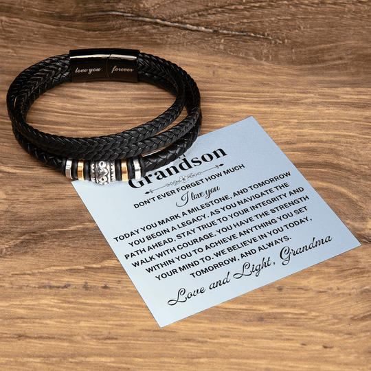 Grandson braided leather keepsake graduation milestone gift with a heartfelt note on a wooden background.