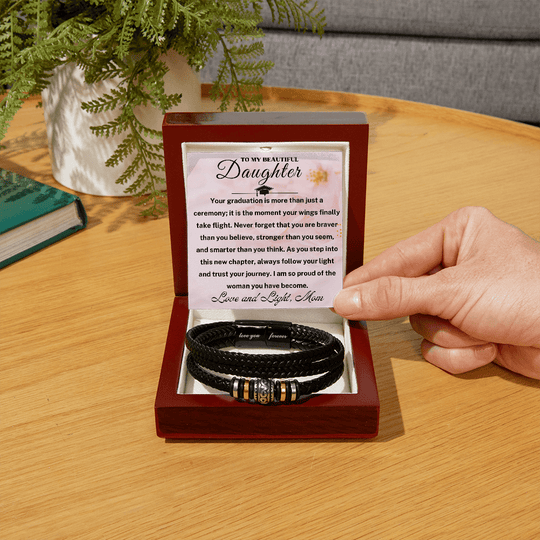 Meaningful graduation gift for daughter with braided leather bracelet in presentation box.