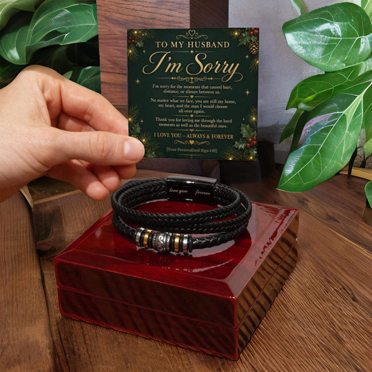Hand holding a Love You Forever apology bracelet with message card, a perfect sorry gift for husband.