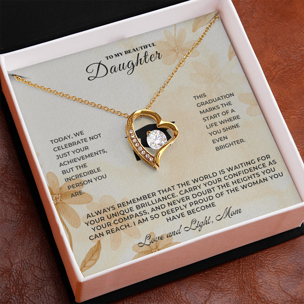 Graduation Gift for Daughter – Graduation Necklace in a gift box with heartfelt message and gold heart design.