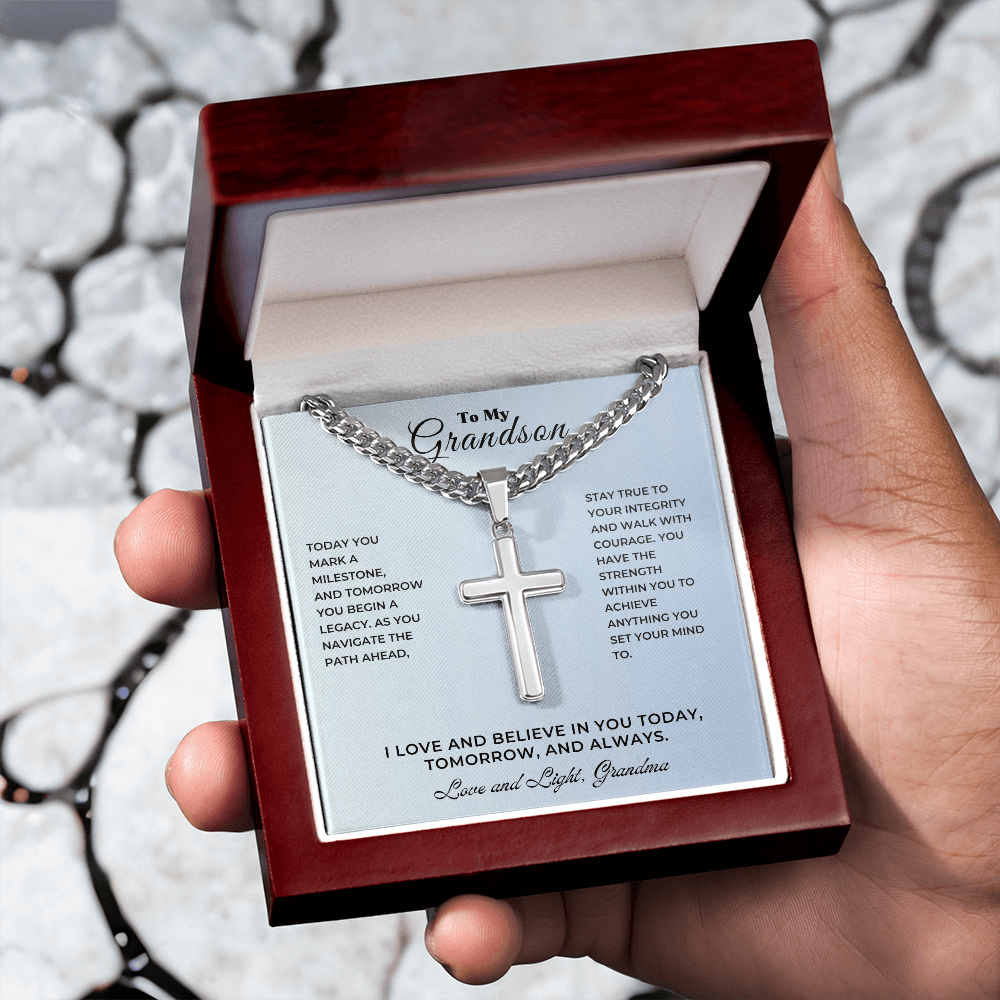 A personalized cross keepsake graduation gift in a presentation box, symbolizing love and encouragement for a grandson's milestone.