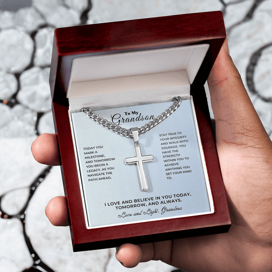 A personalized cross keepsake graduation gift in a presentation box, symbolizing love and encouragement for a grandson's milestone.