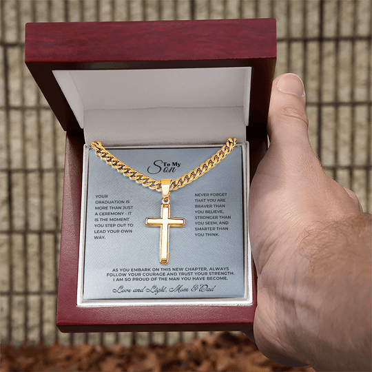 A heartfelt meaningful milestone gift for loved ones, featuring a gold cross necklace in a presentation box.