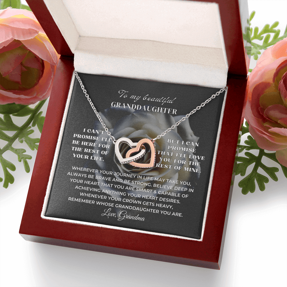 Interlocked hearts necklace in a gift box for granddaughter, sentimental grandparents to granddaughter appreciation keepsake.
