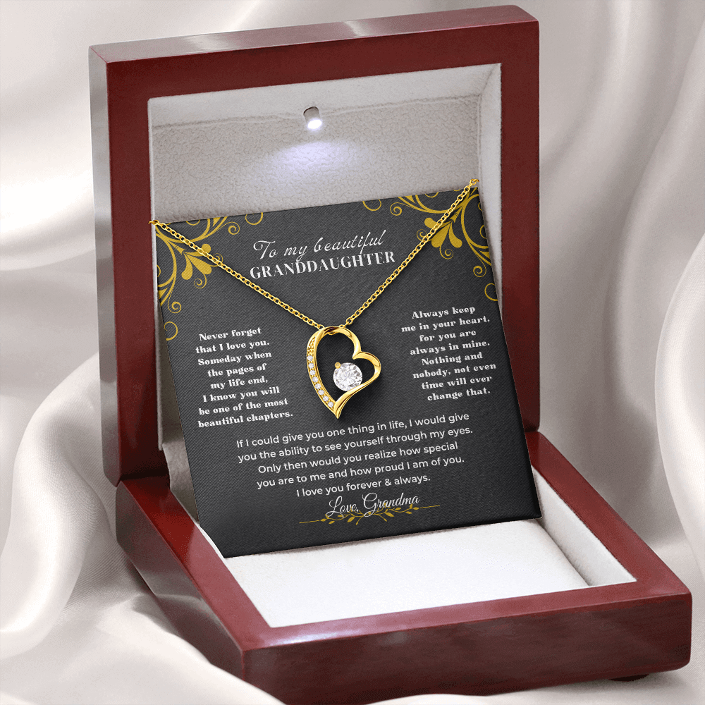 Gold heart pendant necklace for granddaughter in gift box, perfect for unexpected milestone graduation or birthday gift for granddaughter.